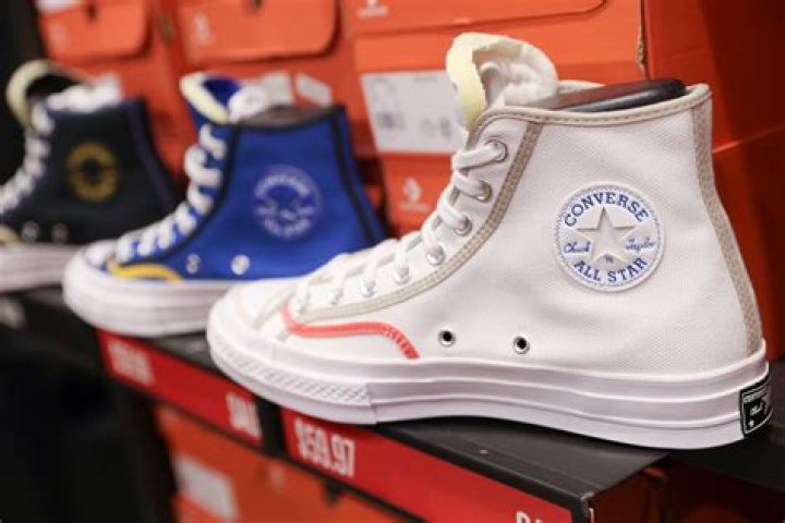 Who is Converse owned by?