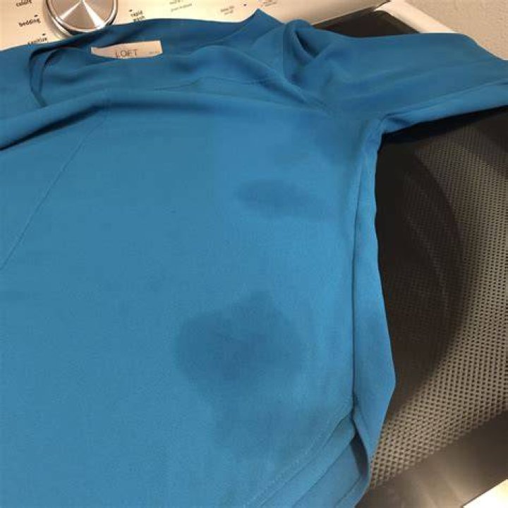 Why do I have grease spots after washing?