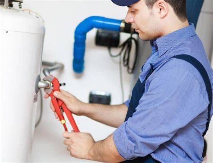 Why do my pipes rattle when I run hot water?