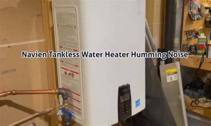 Why does my electric water heater make a loud humming noise?