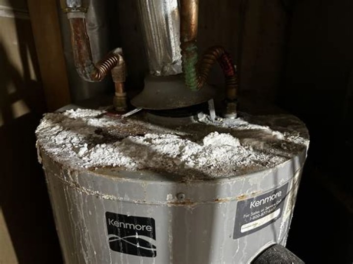 Why does my hot water come out blackish?