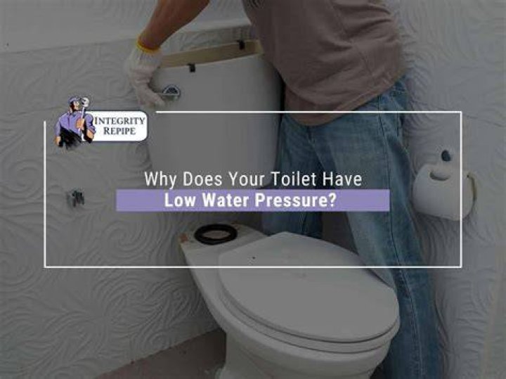 Why does my water pressure go down when I flush the toilet?
