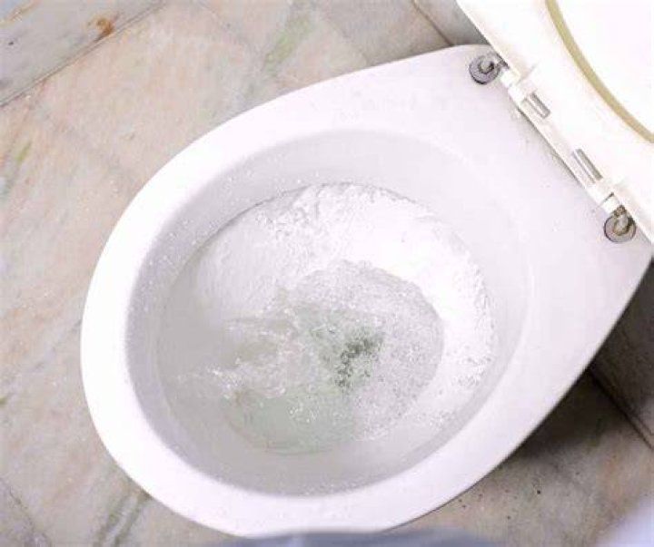 Why does water run out of toilet when it rains?