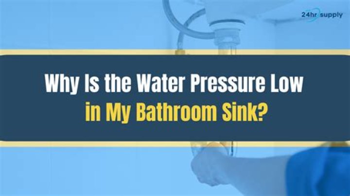 Why is my bathroom sink water pressure low?