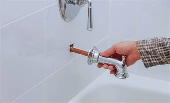 Why is my faucet in my tub leaking?
