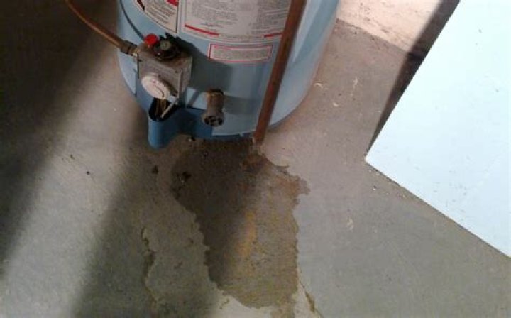 Why is my gas water heater leaking from the top?