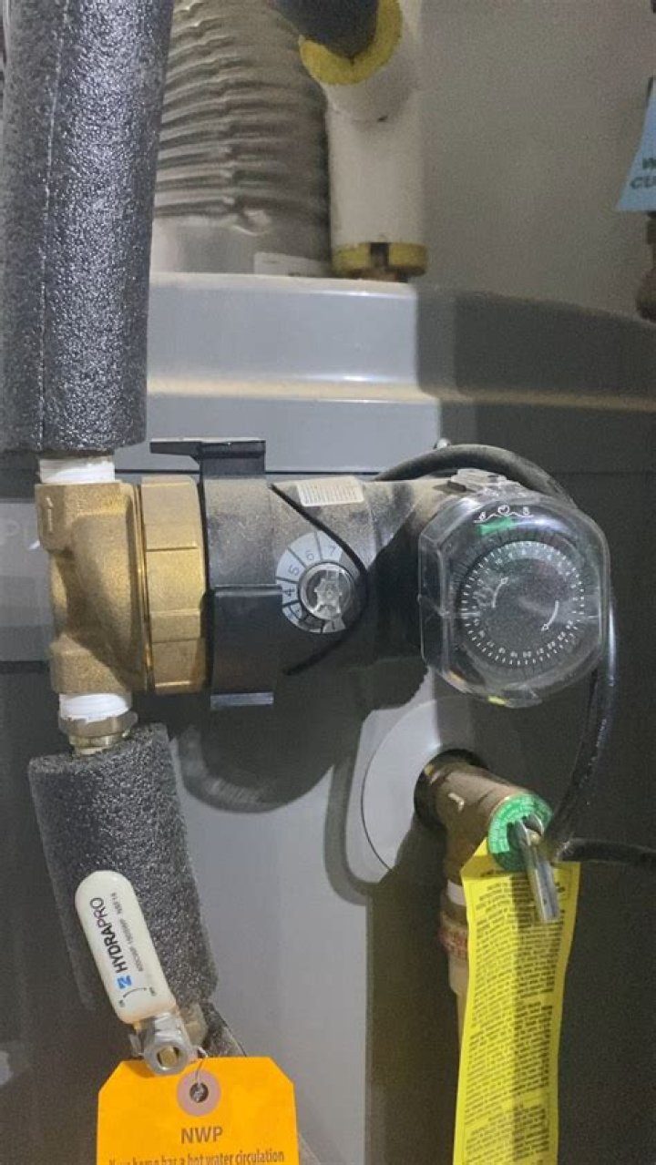 Why is my hot water tank buzzing?
