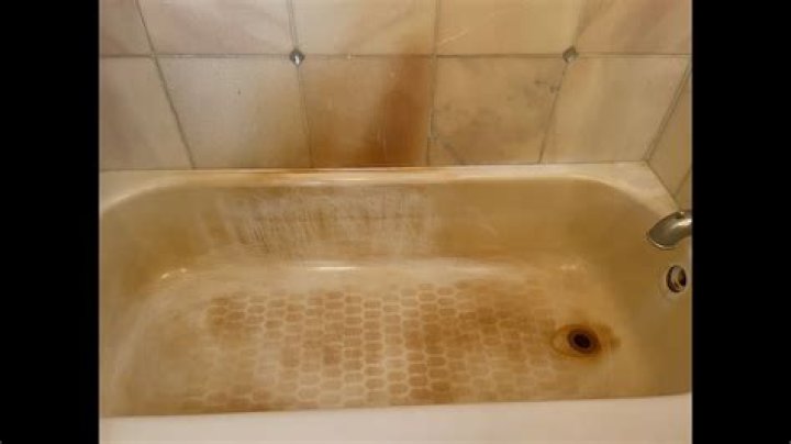 Why is my tub water rusty?