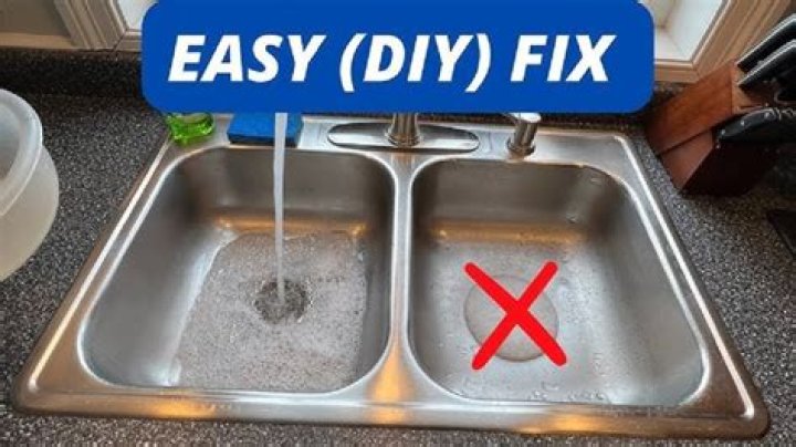 Why is one side of my sink draining into the other?